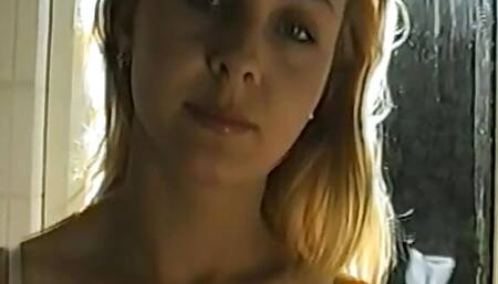 I film the blonde Simona with the phone, an exhibitionist girl with swollen boobs while she fucks a big cock