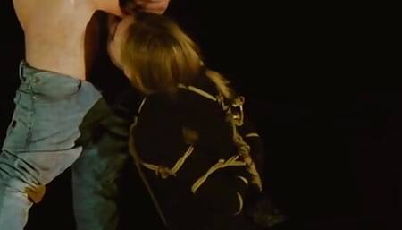 Rebel Rhyder gags on her dom's light wand and cock while tied on a starry night in Colorado