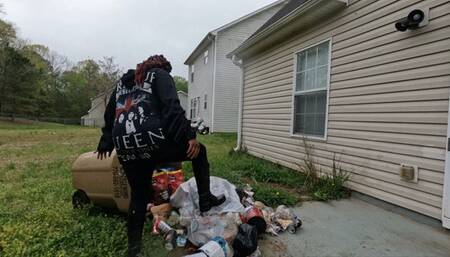 trash stomp in black boots