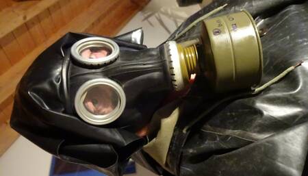 rubber gasmask nun is ramming asshole with two big dicks