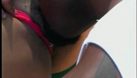 Horny black whore titty fucks a huge black cock