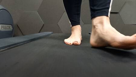 Giant sweaty feet walk on a treadmill