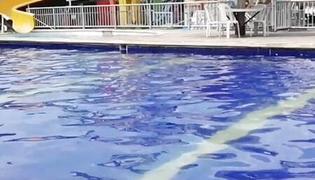 Amateur couple kissing and masturbating in the pool, end up fucking in the bathroom