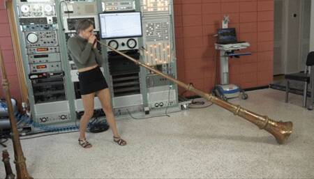 Lora Tries Out the Tibetan Horns (MP4 - 720p)