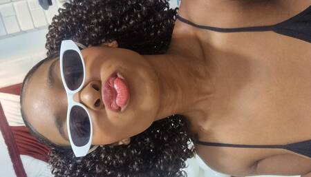 A rainbow dildo fucking some tits