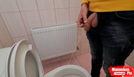 Guy pisses in a public toilet and takes a selfie