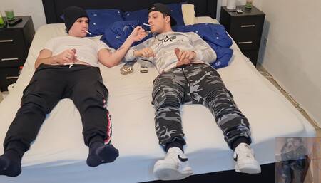 Gay couple smoking, kissing, wanking their big dicks, blowing and cumming on the ashtray