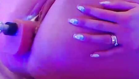 Female cum flows from an orgasmic throbbing pussy