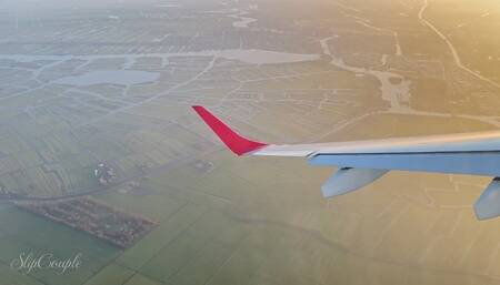 Very sloppy Handjob and Blowjob in a plane - so risky in public