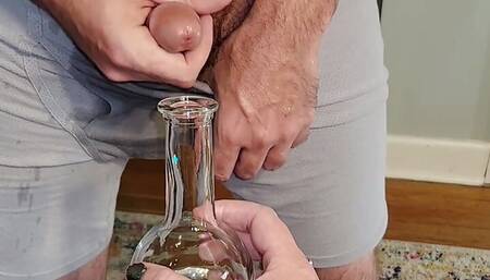 Piss and cum experiment with a bottle