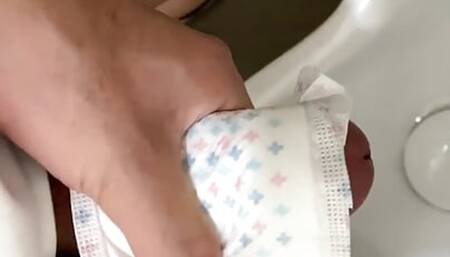 Cumming on the Sanitary pad in public toilet