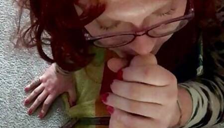 Sissy enjoying sucking off a dildo