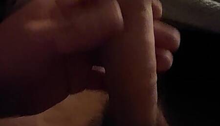 Stroking hard cock