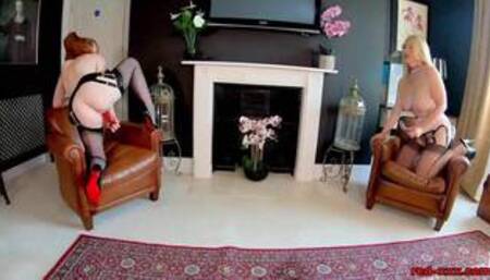 Lucy Gresty and Red (Red XXX) in a masturbating scene and in masks lesbian scene also