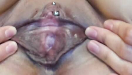 stretching a super swollen pussy with piercings