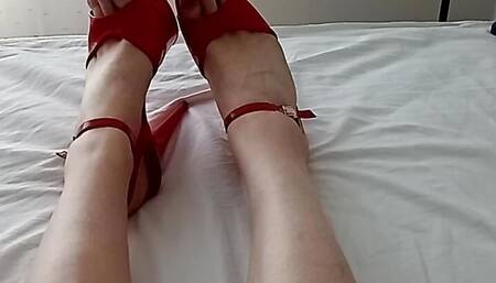 horny MILF translady talks in her sexy voice and shows off her red painted toes in her favorite red high heels
