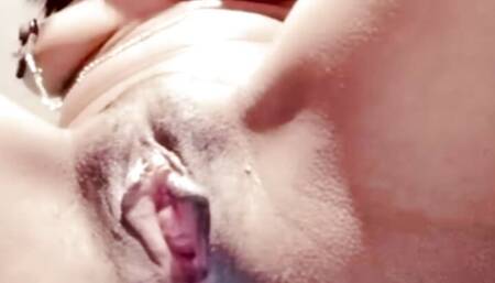Rub my clits with my pink dildo