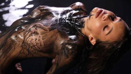 The first-class model ArinaQ shows off her impressive body