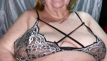 Very chubby old woman with huge tits wears black lingerie and has a wet pussy