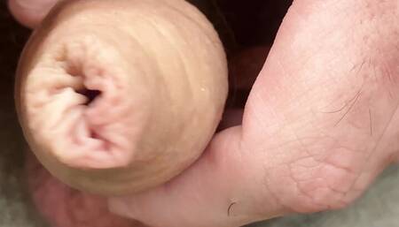 Closeup foreskin play