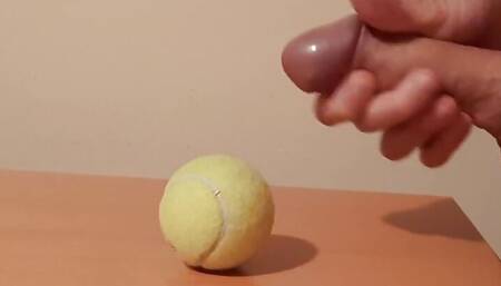 Handjob and cumshot on tennis ball