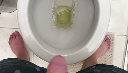 Boy pissing fat dick