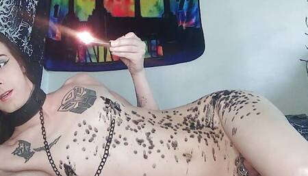 a trans girl and a candle having fun