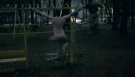 Self whipped and crucified in public park by night