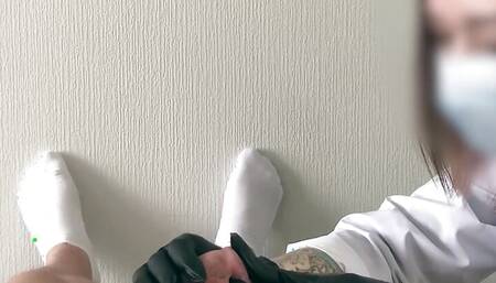 medical exam of a flaccid uncut cock POV