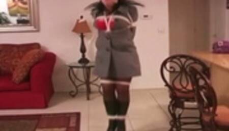 Gina Rae hops through out the house in a coat boots and gloves