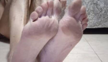 Naked on the floor with dirty feet, hairy ass and flaccid cock