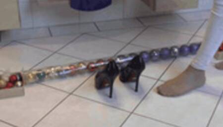 Xmas ornaments under high heel pumps