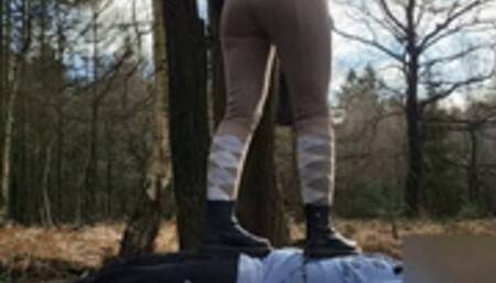 Trampling body and cock in rough combat boots and equestrian leggings
