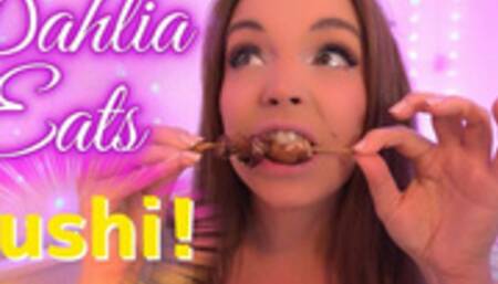 Girl eats sushi close up with chopsticks and then shows boobs