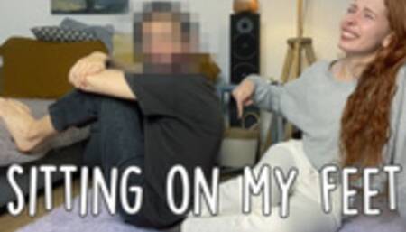 SITTING ON WOMEN'S FEET by KittyStepsis