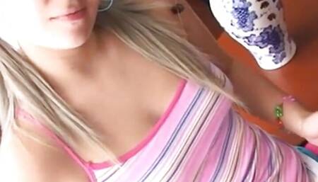 Petite blonde goes solo finger fucking her pussy