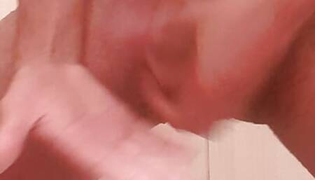 Young young man masturbating until he cums in the bath