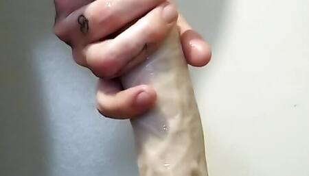 Riding a dildo