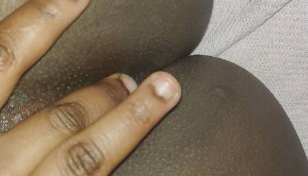 Moaning while fingering my horny black pussy. I can't ant stop cumming