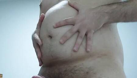 Chubby man rub his belly, play with his cock and cums