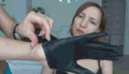 hands in leather gloves over her mouth and on her neck IV