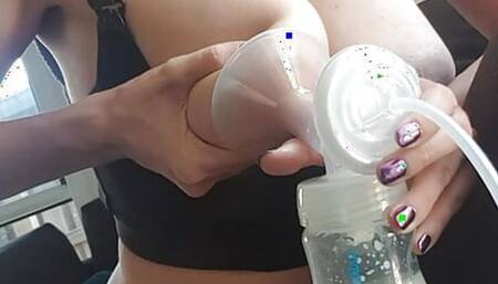 Squeezing tits really hard. Watch the milk flow