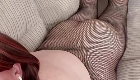 CROSSDRESSER TVROSE ASS THRUSTING AND CLENCHING IN BLACK FISHNET BODYSTOCKING FRONT VIEW