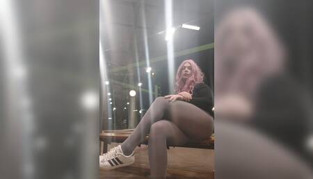 Tranny sitting on the train station in pantyhose at night and waiting for the train