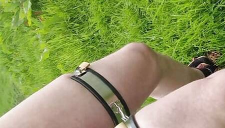 Fag pup outdoors in his chastity belt