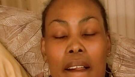 Gorgeous wet pussy ebony masturbates sensually in front of the spotlight
