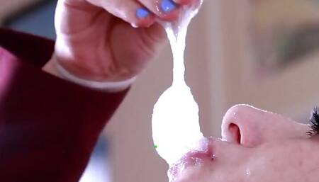 Brit teen eats cum out of a shot glass