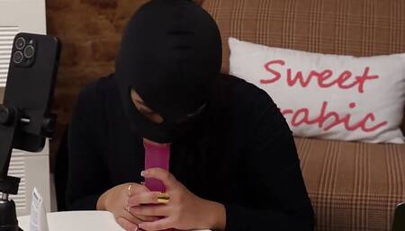 Jasmine has fun with her dildo sucking it