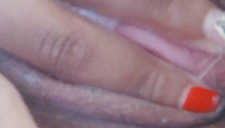 The Latin whore touches her pussy