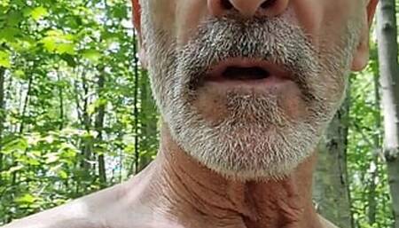 Daddy take a walk in the Wood, stroking his dick, and  have his balls bouncing in the outdoors